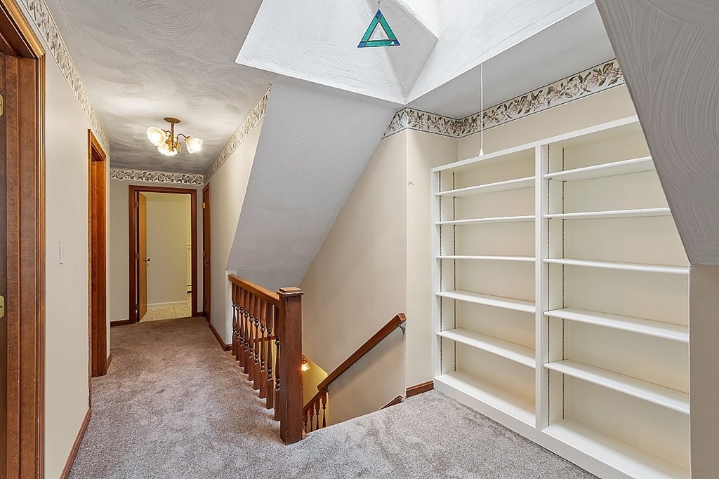 16 Galloway Road Chelmsford, MA 01824 - Photo 32 of 42 a view of an empty room with a staircase