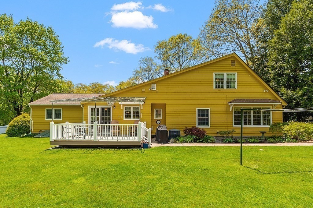 16 Galloway Road Chelmsford, MA 01824 - Photo 6 of 42 a view of front of house with a yard