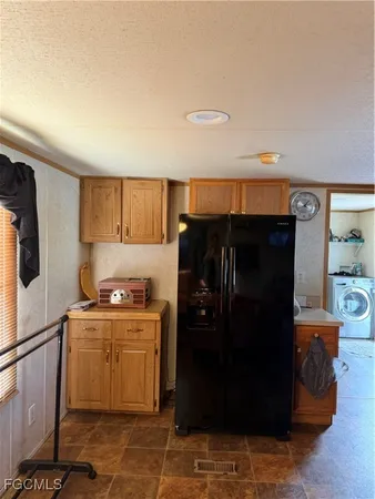 a kitchen with stainless steel appliances a sink stove and cabinets