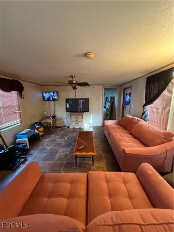 a bathroom with a sink toilet and a mirror