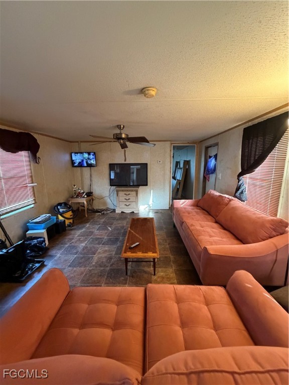 1660 Davidson Road Clewiston, FL 33440 - Photo 13 of 23 a livingroom with furniture and a flat screen tv