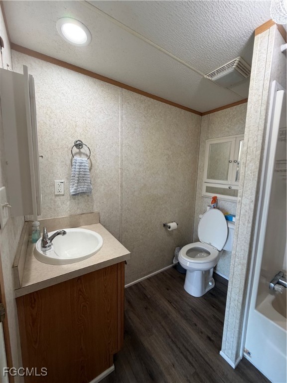 1660 Davidson Road Clewiston, FL 33440 - Photo 16 of 23 a bathroom with a sink toilet and a mirror