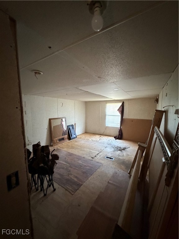 1660 Davidson Road Clewiston, FL 33440 - Photo 20 of 23 a bedroom with a bed and a dresser