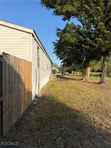 a house with trees in front of it