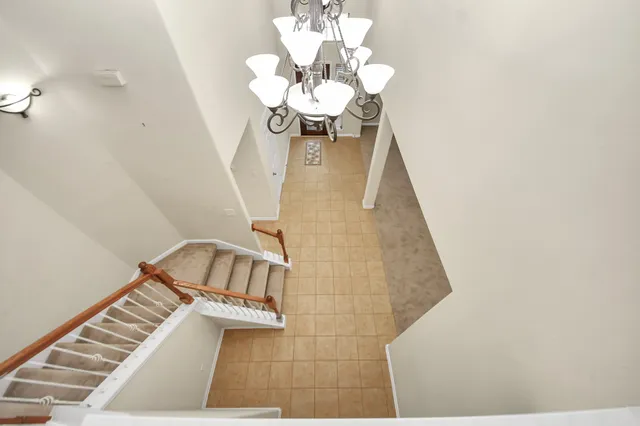 a view of balcony with wooden floor
