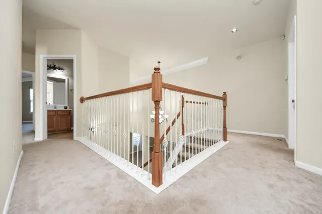 a view of a hallway with windows
