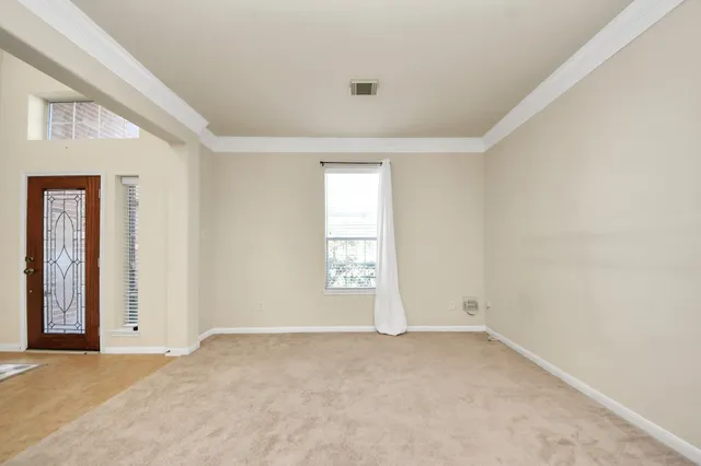 an empty room with windows