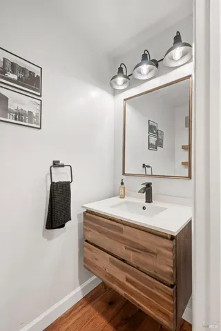 a bathroom with a sink and mirror