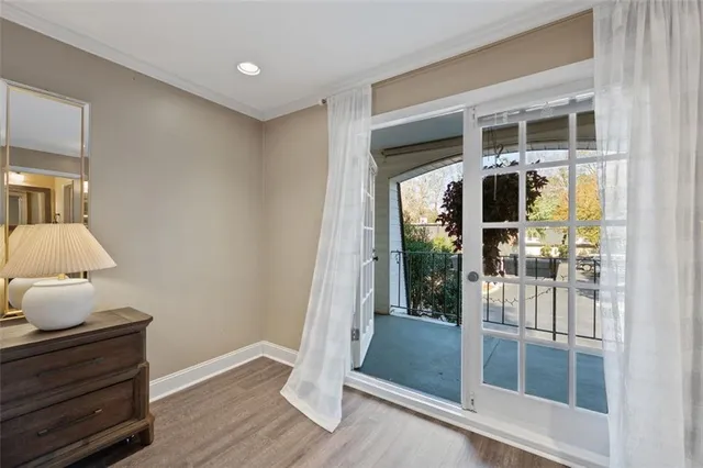 a view of room with wooden floor