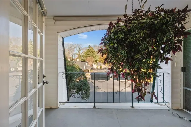 a view of a house with a tree
