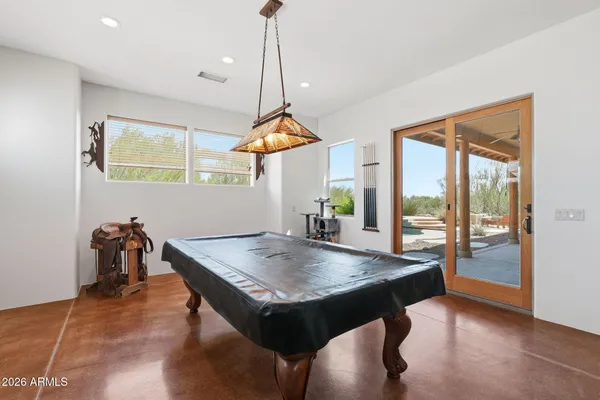 a view of a dining room with furniture window and outside view