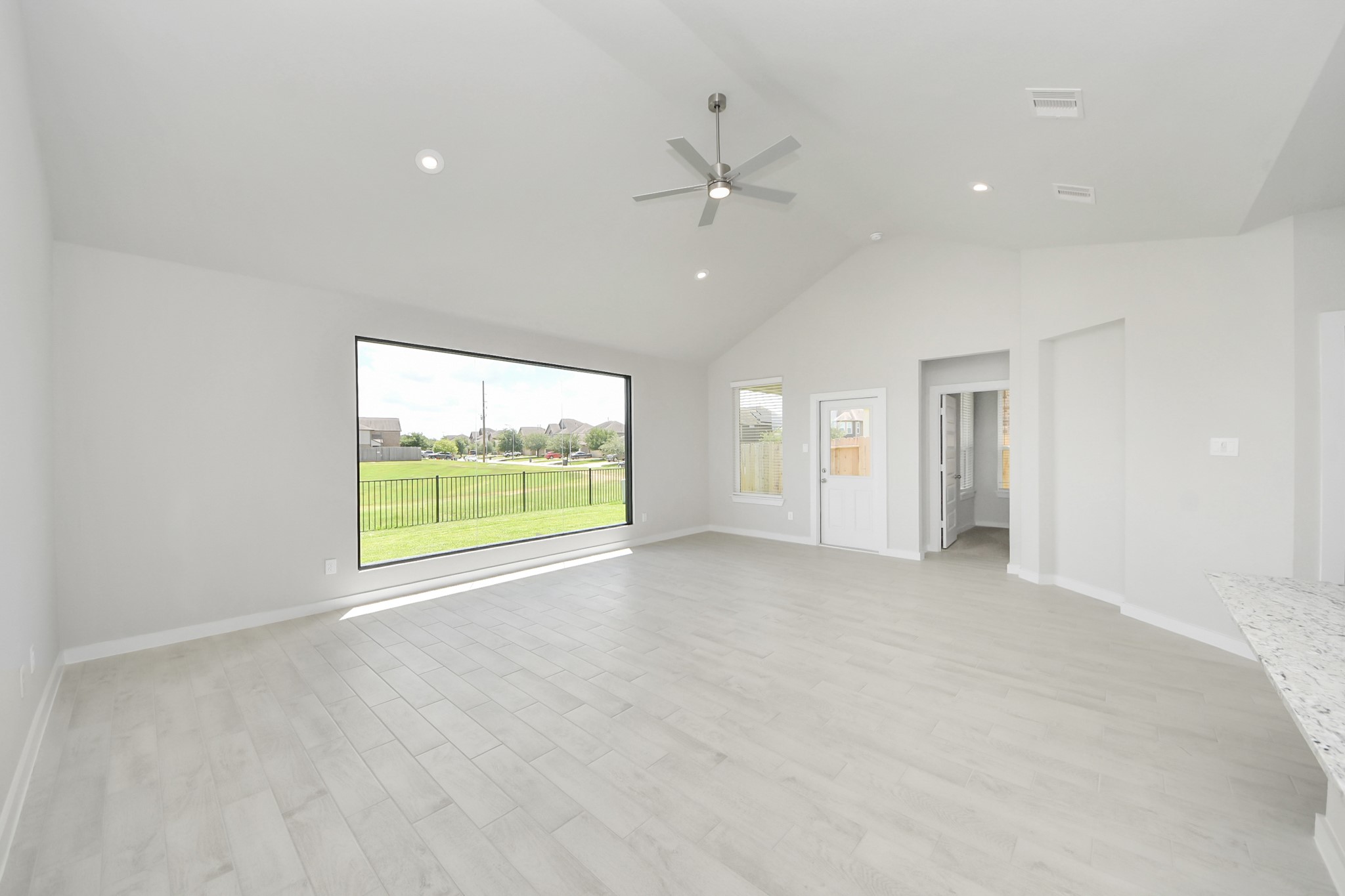 14906 Rural Rdg Road Cypress, TX 77429 - Photo 14 of 46 wooden floor in an empty room with a window