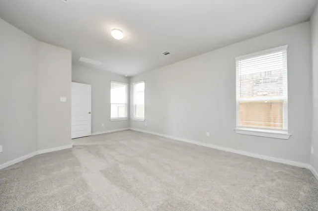 an empty room with windows