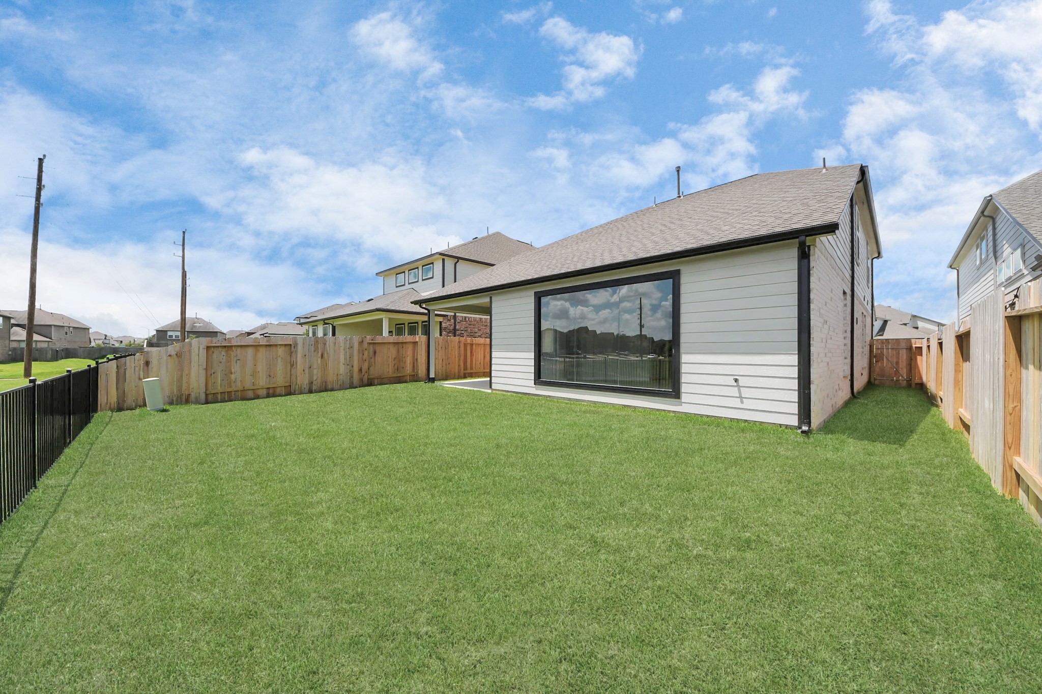 14906 Rural Rdg Road Cypress, TX 77429 - Photo 39 of 46 a view of a backyard