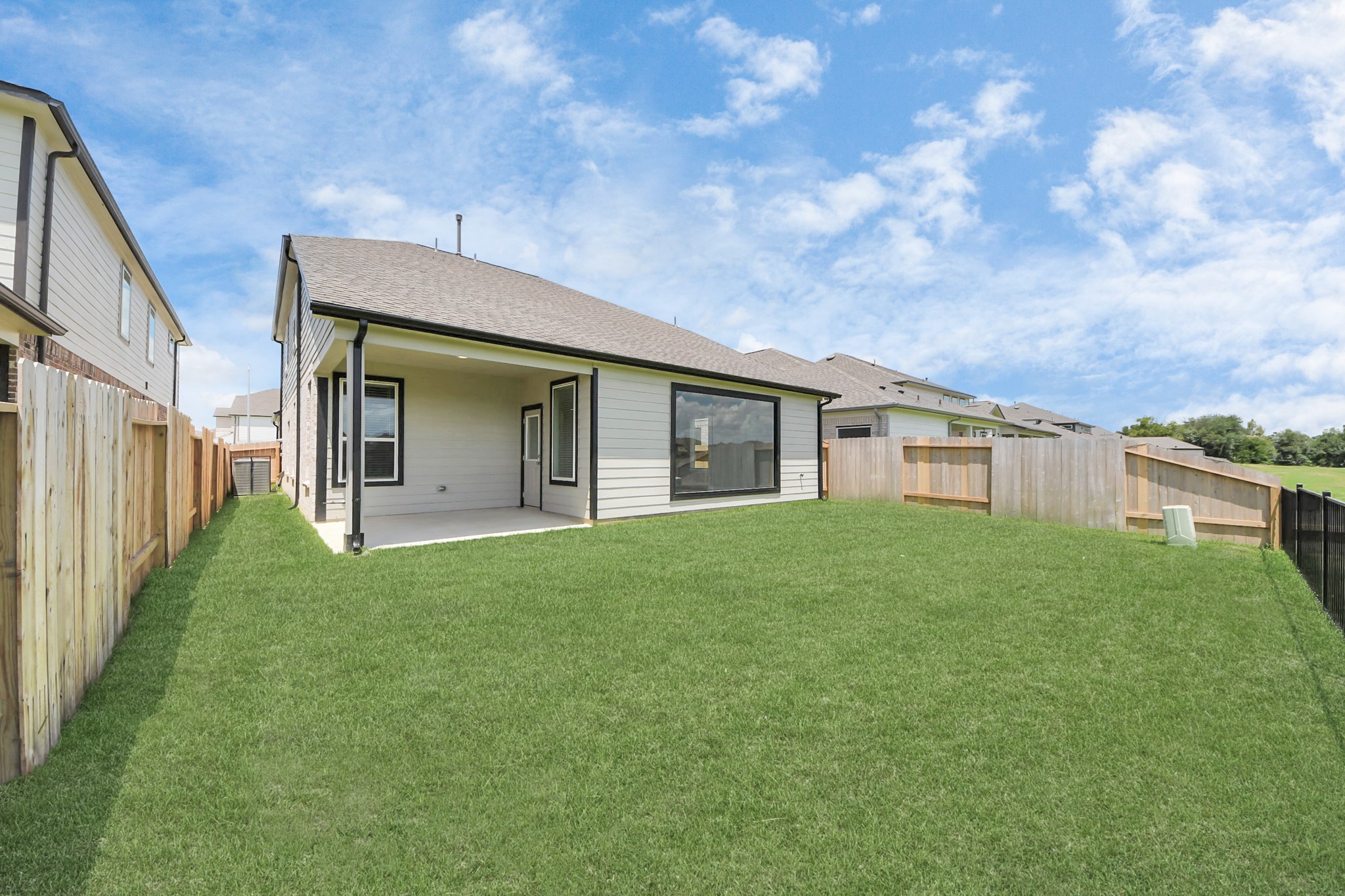 14906 Rural Rdg Road Cypress, TX 77429 - Photo 40 of 46 a view of a house with backyard and garden