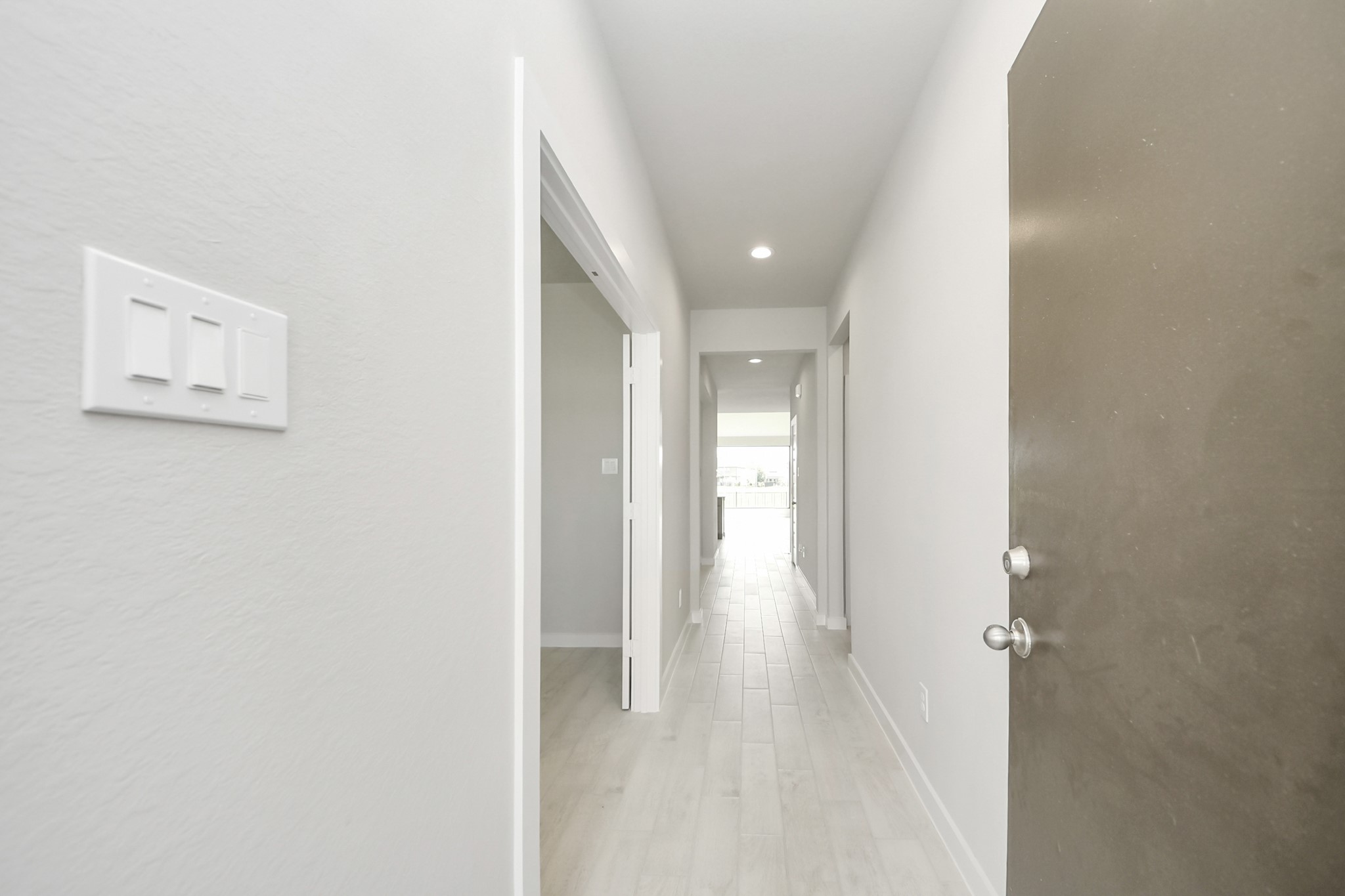 14906 Rural Rdg Road Cypress, TX 77429 - Photo 6 of 46 a view of a hallway with wooden floor