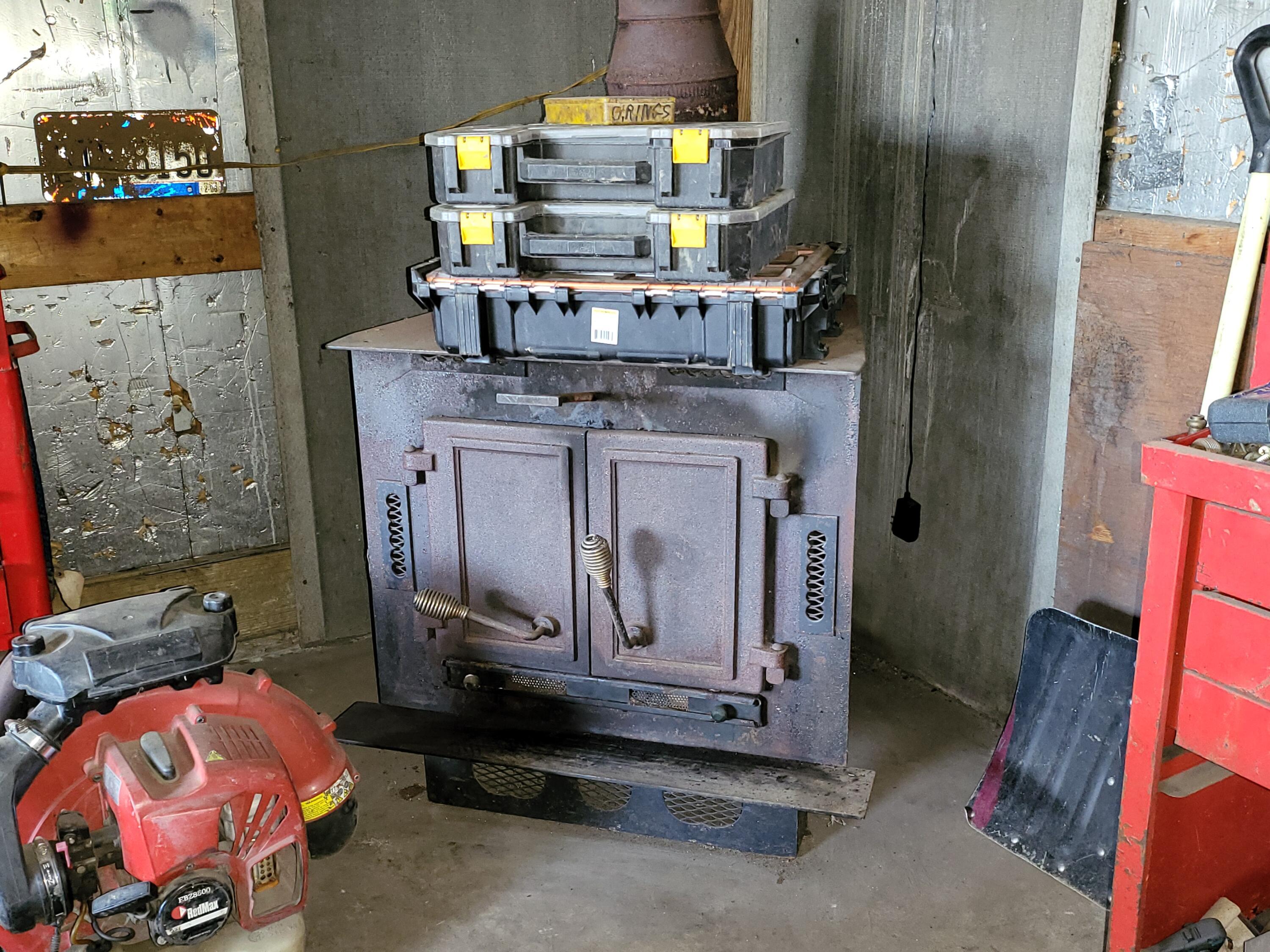 2590 Lockbourne Road Columbus, OH 43207 - Photo 8 of 13 Garage wood burner