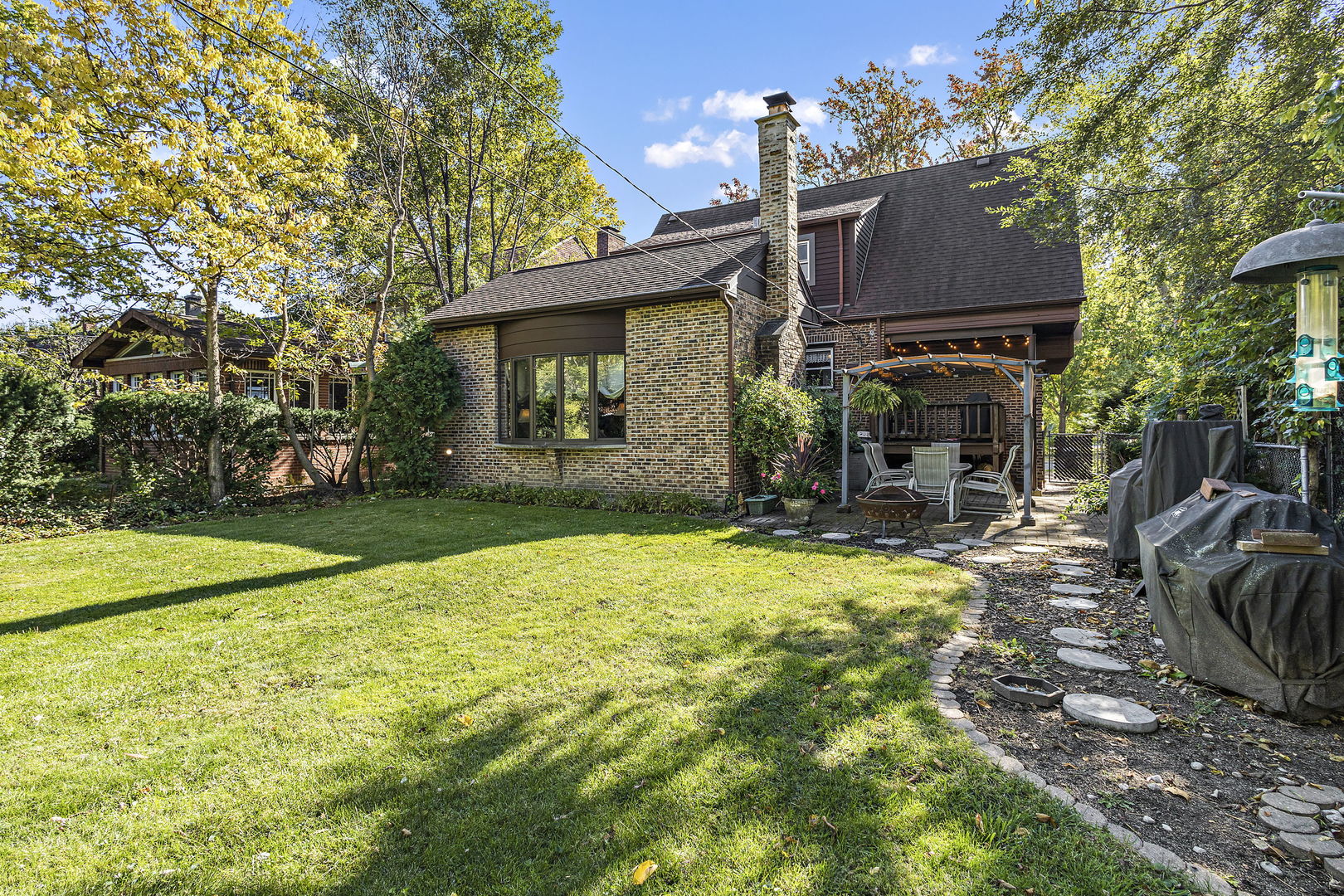 450 Kent Road Riverside, IL 60546 - Photo 21 of 29 a view of a house with backyard and sitting area
