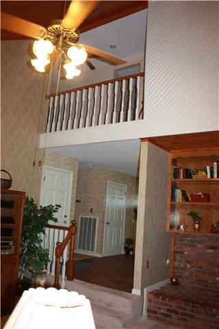 3982 Trough Springs Road Adams, TN 37010 - Photo 9 of 20 Greatroom showing Bonus room up and also showing entry into main foyer.