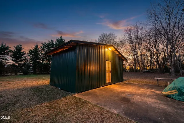 a backyard of a house with lots of green space