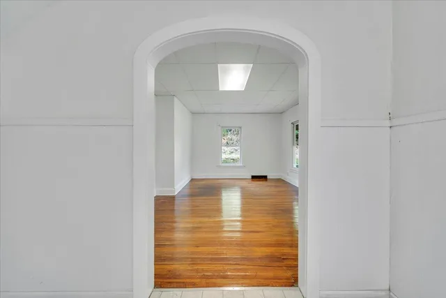 a bathroom with a sink toilet vanity and tub