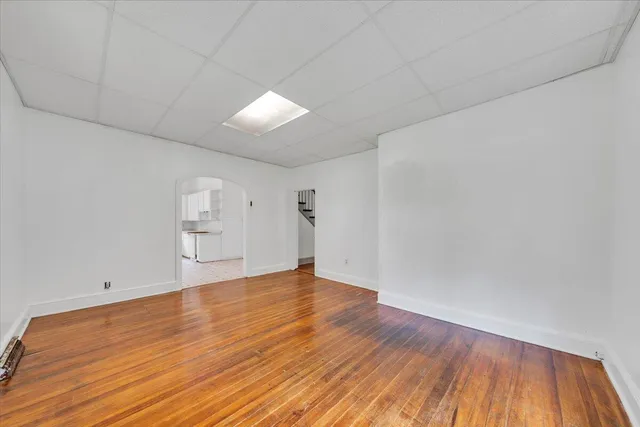 a view of an empty room with a window