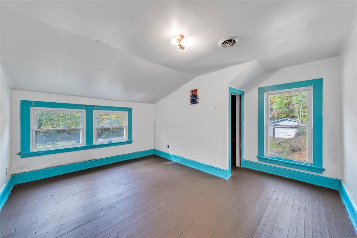 6973 Henry Road Henry, VA 24102 - Photo 30 of 110 wooden floor in an empty room with a window