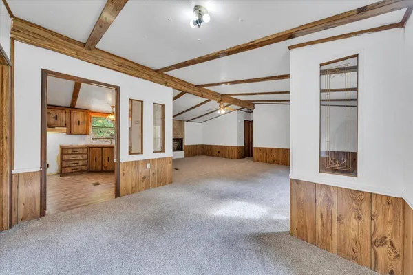 a view of balcony with wooden floor