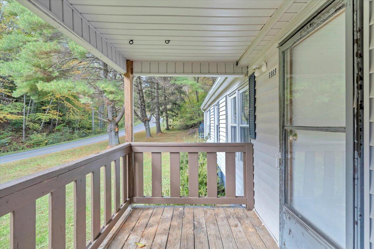 6973 Henry Road Henry, VA 24102 - Photo 57 of 110 a view of a porch with wooden floor