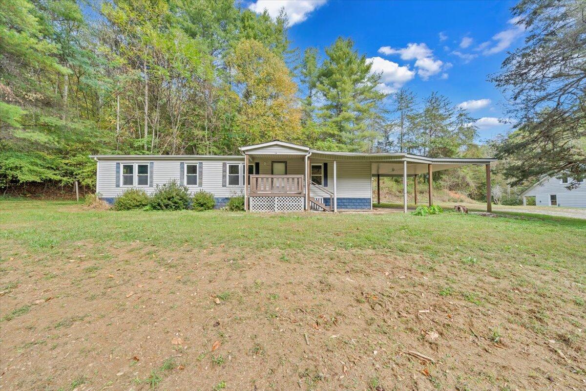 6973 Henry Road Henry, VA 24102 - Photo 60 of 110 a view of a house with yard and sitting area
