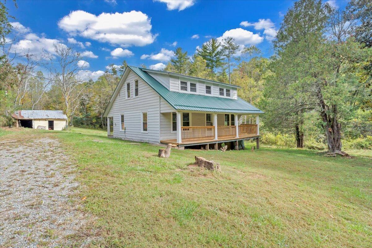 6973 Henry Road Henry, VA 24102 - Photo 63 of 110 a view of a house with a backyard