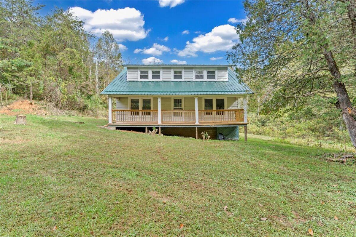 6973 Henry Road Henry, VA 24102 - Photo 65 of 110 a view of a house with a backyard