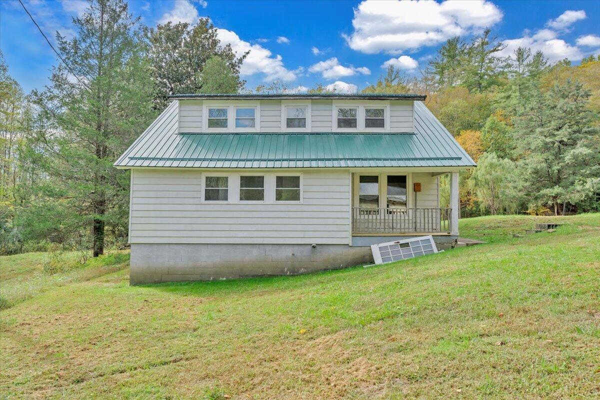 6973 Henry Road Henry, VA 24102 - Photo 71 of 110 a view of a house with a yard