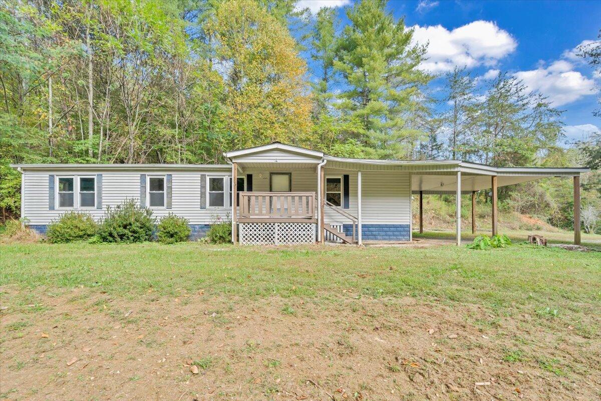 6973 Henry Road Henry, VA 24102 - Photo 75 of 110 a view of a house with backyard porch and garden
