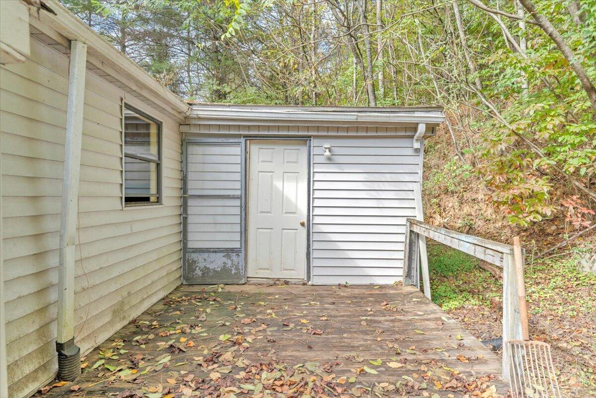 6973 Henry Road Henry, VA 24102 - Photo 83 of 110 a side view of a house with a yard