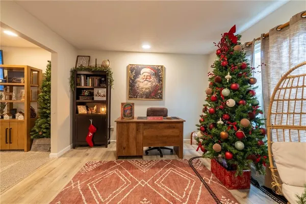 a bed room with a bed and a bookshelf
