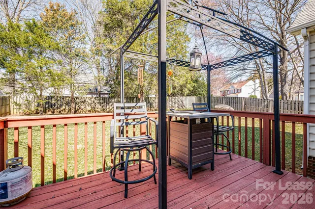 a view of a chairs on the roof deck