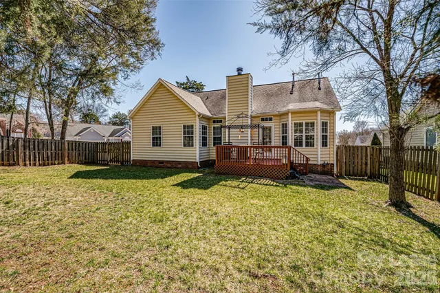 a view of yard with swimming pool