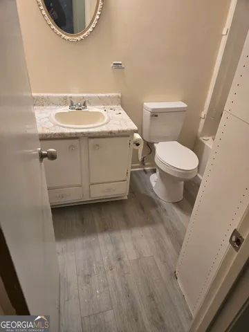 a bathroom with a sink and a toilet