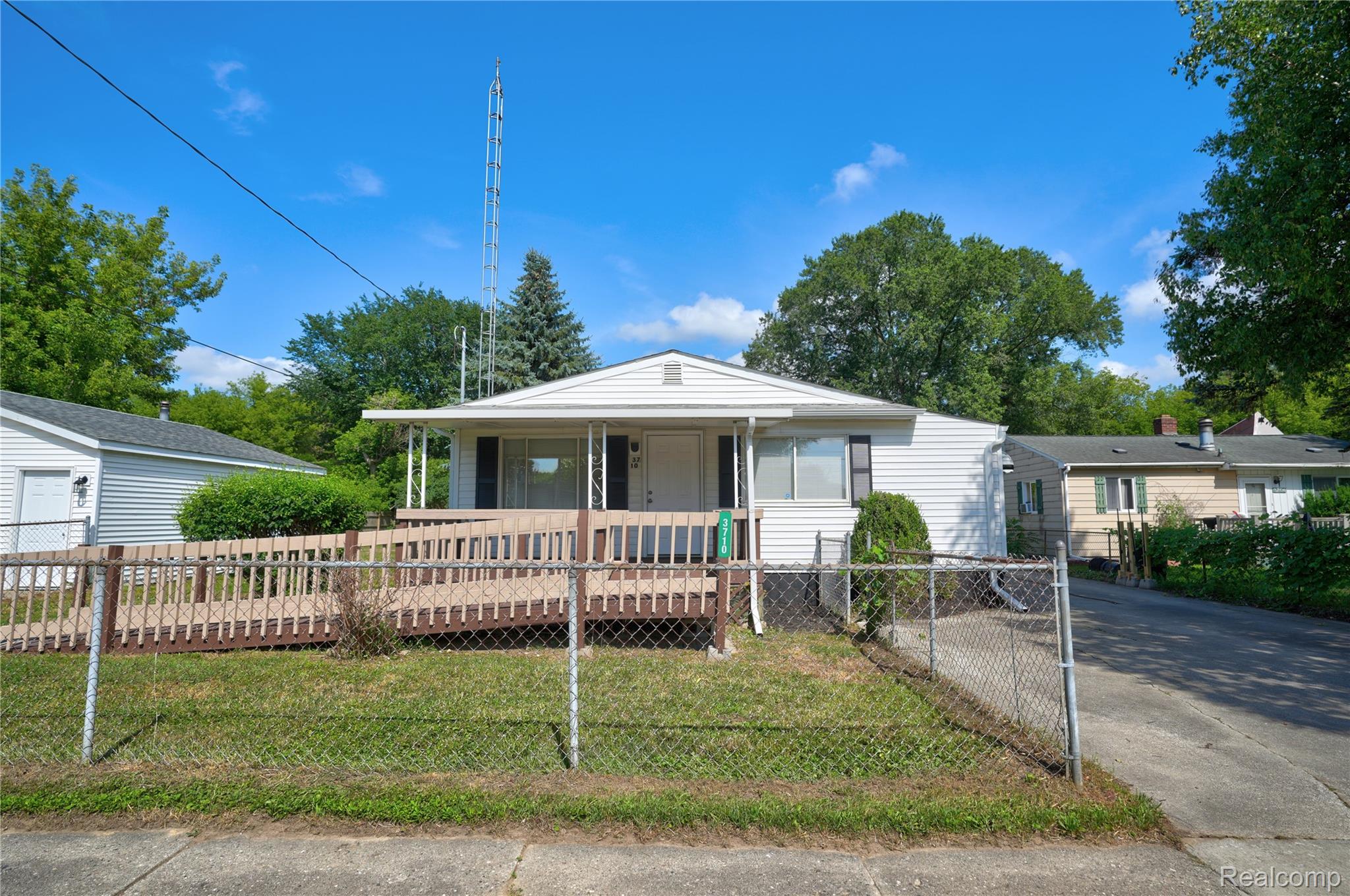 3710 Branch Road Flint, MI 48506 - Photo 3 of 46 Ranch-style exterior with a covered front porch