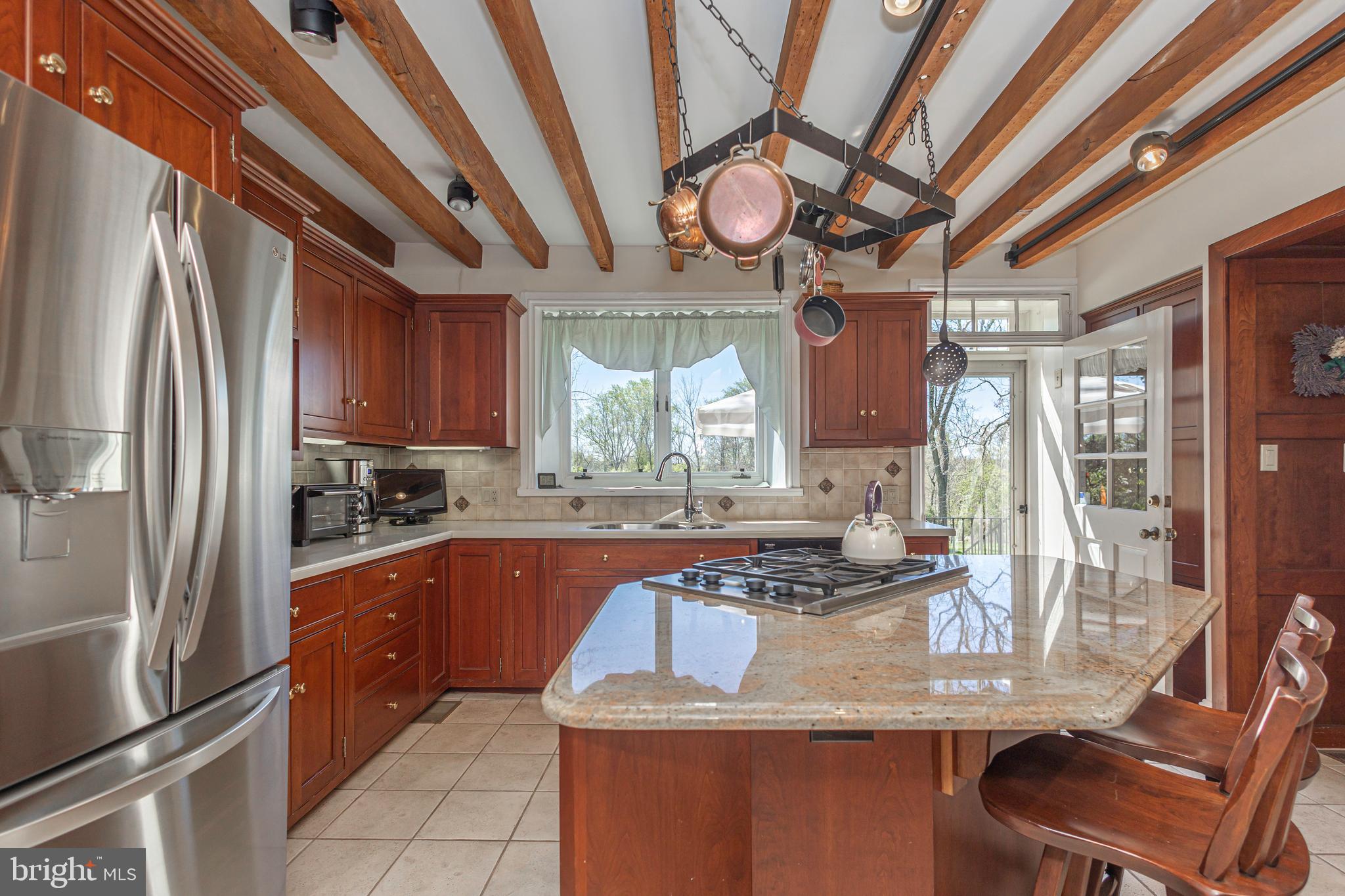 1193 Swamp Road Furlong, PA 18925 - Photo 29 of 70 Kitchen with exposed beams