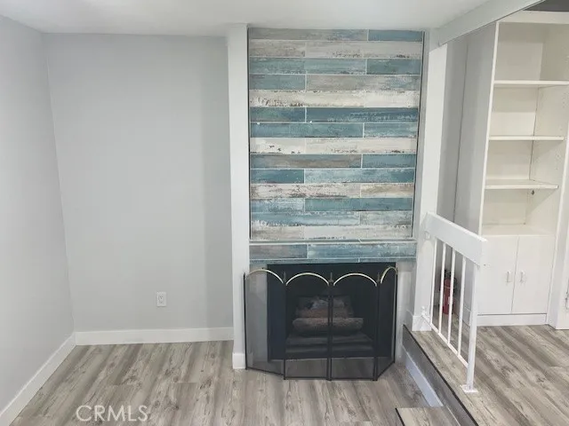 a view of a livingroom with a fireplace