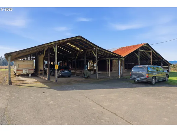 a view of a car park in front of house