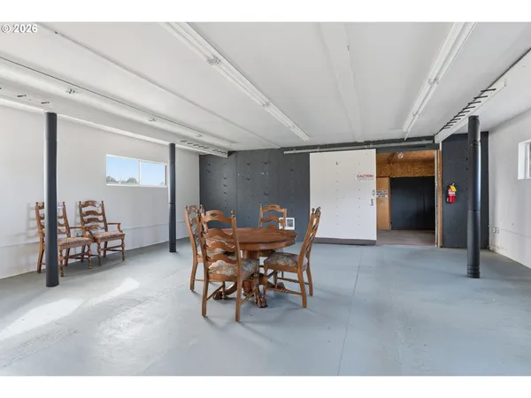 a dining room with furniture and a livingroom