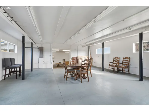 a living room with furniture and a table