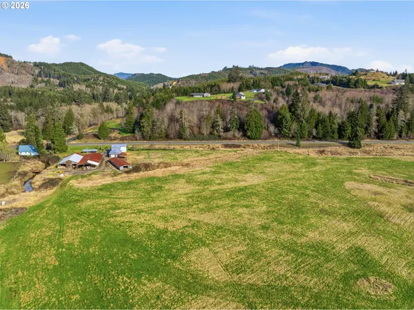 a view of a town with mountains in the background