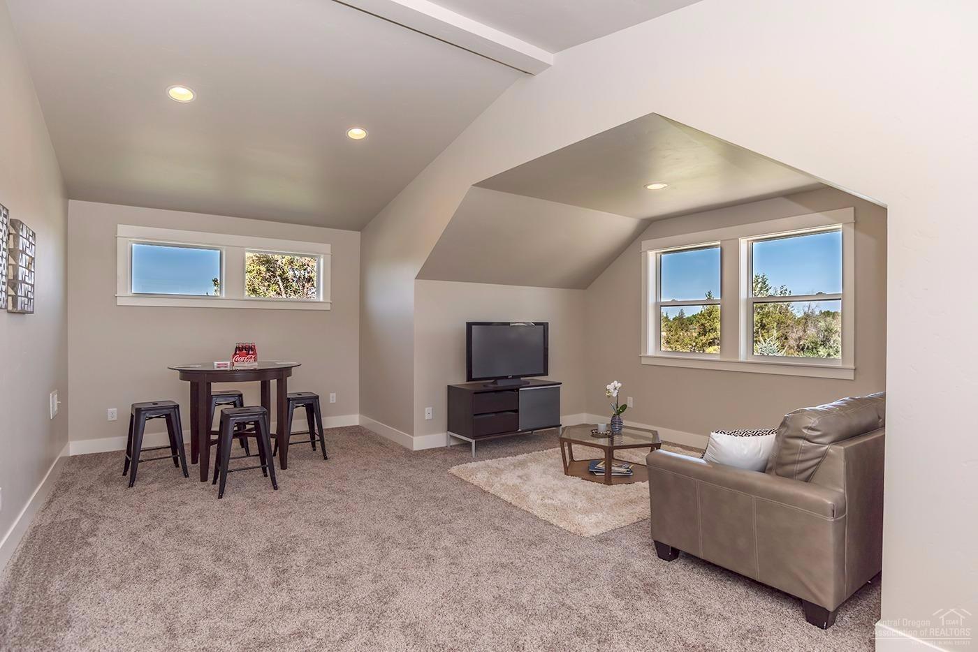 988 Northwest Rimrock Drive Redmond, OR 97756 - Photo 21 of 24 Bonus room over the garage is well separ