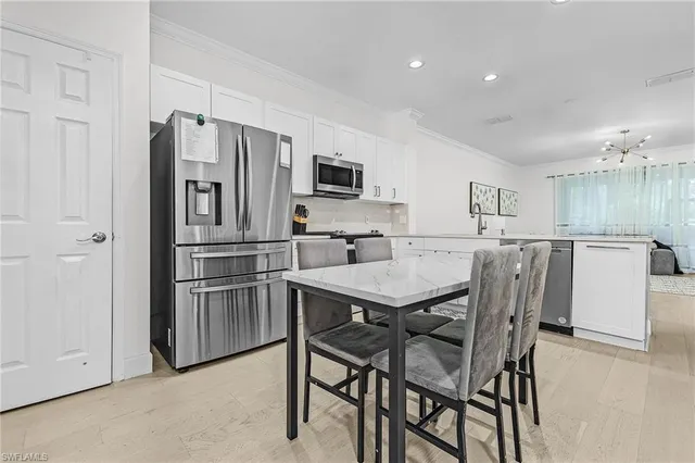 $399,999 | 1285 Oxford Lane, Unit 227, Naples, FL 34105