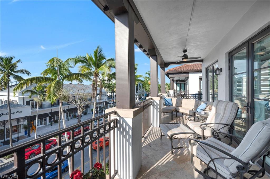 780 5th Avenue South, Unit 302 Naples, FL 34102 - Photo 16 of 20 a view of a chairs and table in patio