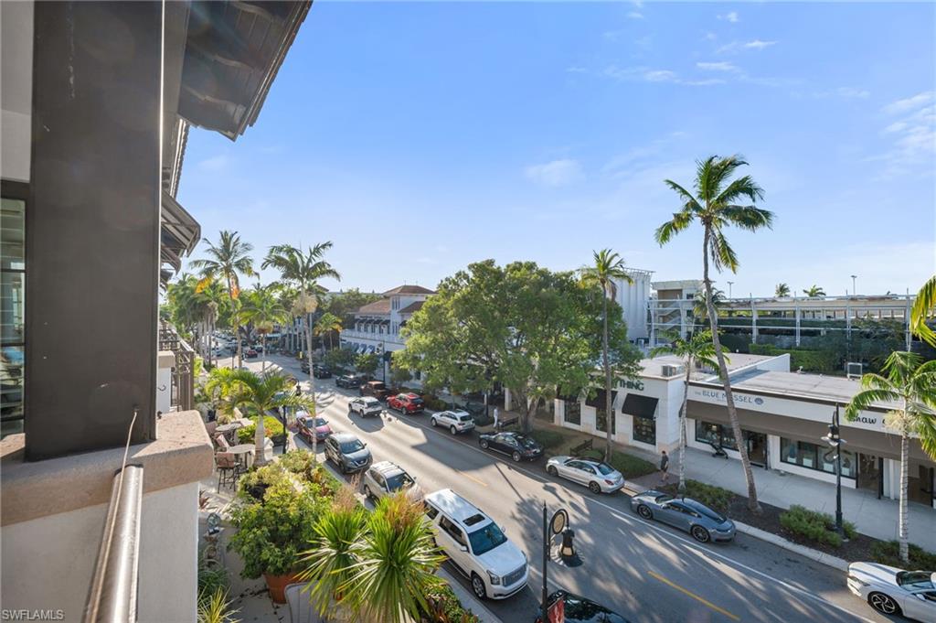 780 5th Avenue South, Unit 302 Naples, FL 34102 - Photo 17 of 20 a view of a swimming pool with a patio